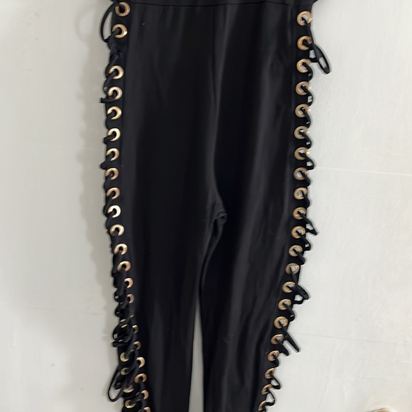 Sexy black jumpsuit with grommets down legs - Picture 3 of 7